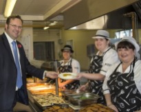 MP Stephen Mosley gets his lunch from the kitchen staff. Photo:Flickr/Cheshirewest